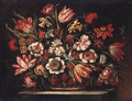 Flowers in a basket on a stone ledge - (after) Margherita Caffi