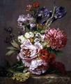 Irises peonies and other flowers in a vase - Lodewijk Johannes Nooijen