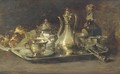 A silver tete aA  tete, a bottle and brioches on a table - Guillaume-Romain Fouace