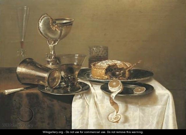 An overturned silver tumbler and a roemer on a pewter plate, a facon-de-Venise wineglass, a nautilus cup, a pie and a partly-peeled lemon - Gerrit Willemsz. Heda
