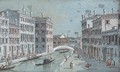 A Venetian canal with a bridge in the distance - Giacomo Guardi
