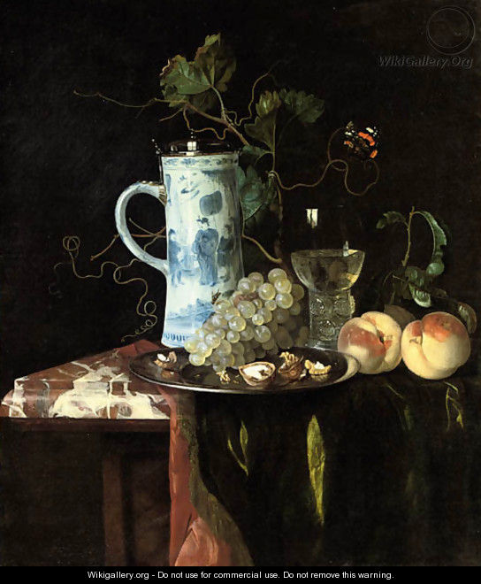 A Chinese transitional blue and white silver-mounted tankard, grapes and walnuts on a silver plate, a 