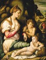 The Madonna and Child with Saint John the Baptist seated among rocks, a village beyond with shepherds - (circle of) Ubertini, (Bacchiacca)
