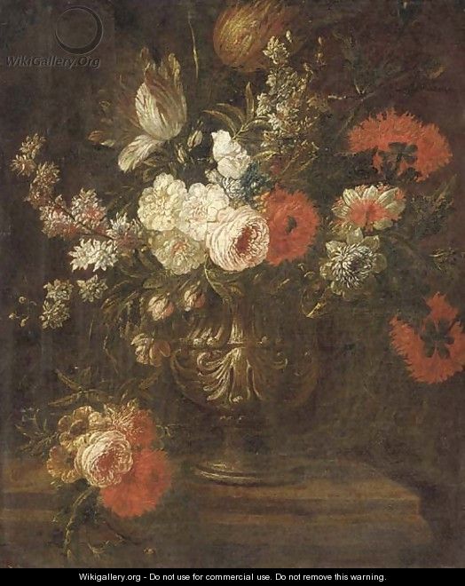 Parrot tulips, narcissi, roses, chrysanthemums and other flowers in an urn on a ledge - (follower of) Nuzzi, Mario