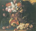 A still life of flowers in a bronze vase, with a melon, grapes, peaches and other fruit on a forest floor - Gaspar-pieter The Younger Verbruggen