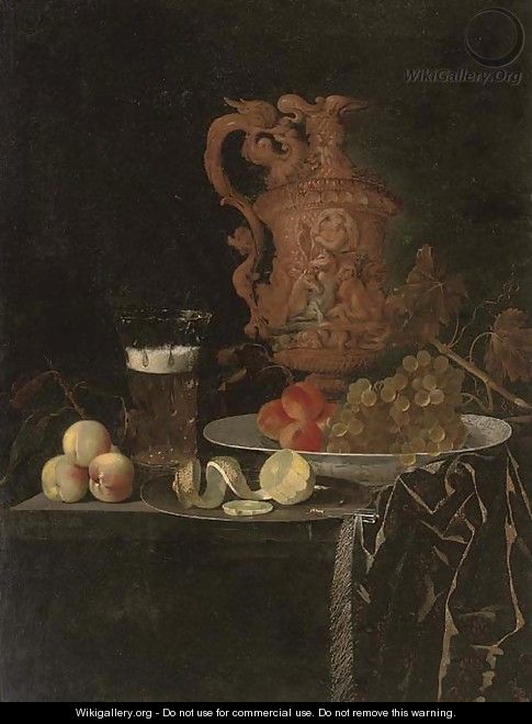 A gilt ewer, a roemer of beer, peaches, a partly-peeled lemon on a pewter tray, and grapes and peaches in a porcelain dish on a partly-draped table - Johann Georg (also Hintz, Hainz, Heintz) Hinz
