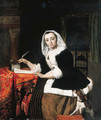 An elegant lady writing at her desk, with a dog beside her - Gabriel Metsu