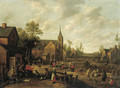 A village scene with peasants playing and conversing - Joost Cornelisz. Droochsloot
