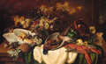 A collection of fruit and game on a table - Ludwig Adam Kunz