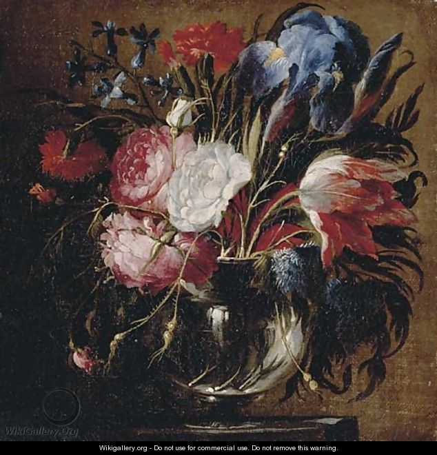 A tulip, carnations, roses, irises, bluebells and other flowers in a glass vase on a ledge - Juan De Arellano