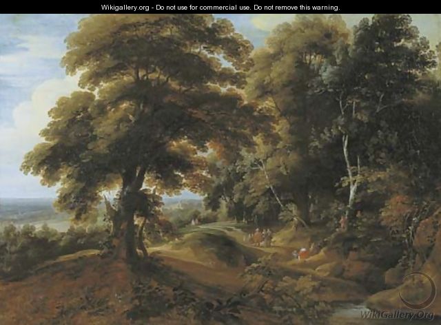 A wooded landscape with elegant figures on a path - Jacques d