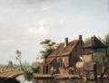 A farmstead by a canal - Isaak Ouwater