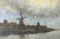 A view of a Dutch town along a river - Hermanus Koekkoek