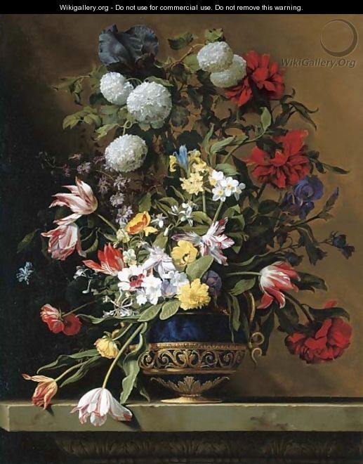 Chrysanthemums, tulips, irises, peonies and other flowers in a lapis vase with gilt ormolu on a sculpted stone ledge - Jean Picart