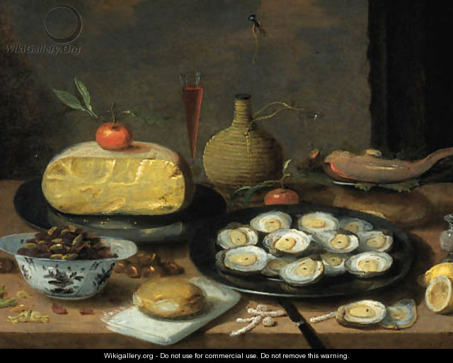 A breakfast still life of oysters on a pewter plate, a half cheese, bread, hazelnuts, chestnuts, lemons, mandarins, a fish, a pepper pot - Jan van Kessel