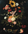A sunflower, roses, parrot tulips, a carnation and other flowers in a glass vase on a partly draped marble table - Jan Weenix