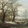 A winterlandscape with a traveller on a path - Pieter Lodewijk Francisco Kluyver