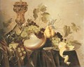 A silver-gilt cup and cover, an upturned roemer resting on a nautilus shell, grapes on the vine and a partly-peeled lemon with a knife - Pieter Nason