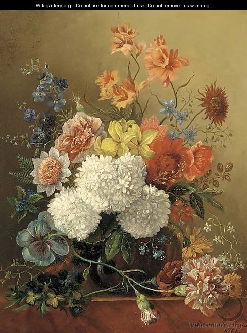 Mixed summer flowers in a glass vase on a ledge - Sara Sartorius