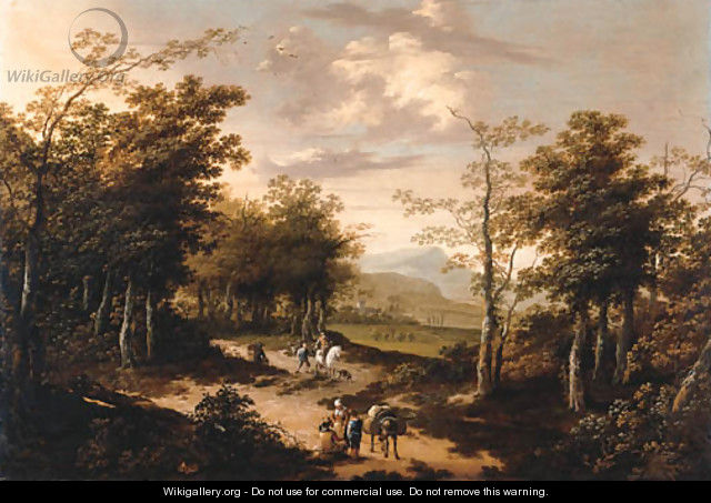 An extensive wooded landscape with travellers on a path - School Of Haarlem