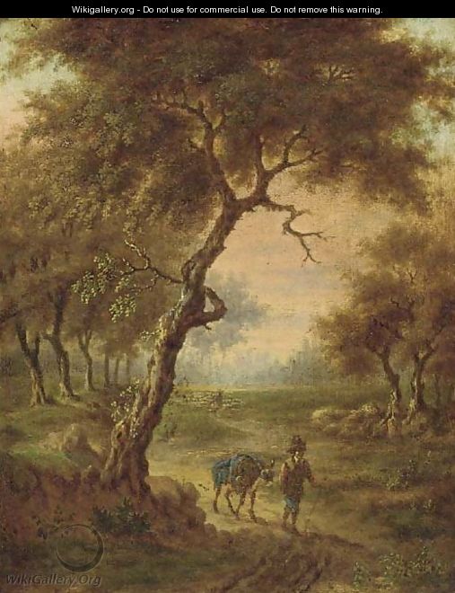 A wooded landscape with a traveller on a path - (after) Jan Wynants