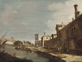A Venetian canal with figures on a path - (after) Francesco Guardi