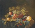 A bowl and a salver of grapes, plums and blackberries by cherries and a lemon on a draped table. - (after) George Forster