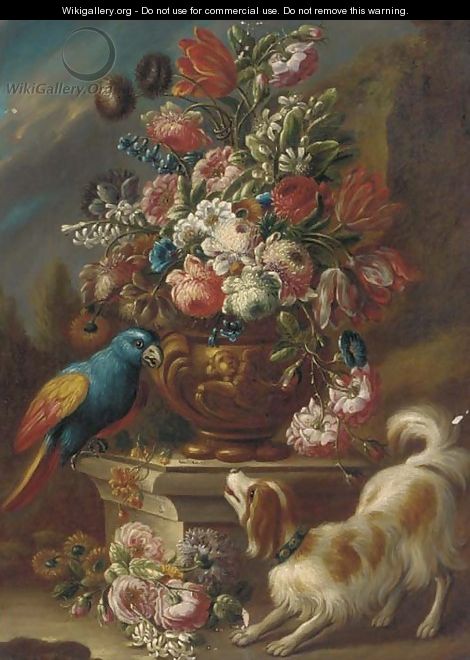 Mixed flowers in an urn on a pedestal with a parrot and a spaniel with other flowers on the ground, a landscape beyond - (after) Gasparo Lopez