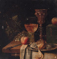 A roemer, a silver-gilt cup, oysters and a peeled lemon on a pewter plate, a knife, a casket with apples and grapes on a partially draped table - Abraham Hendrickz Van Beyeren