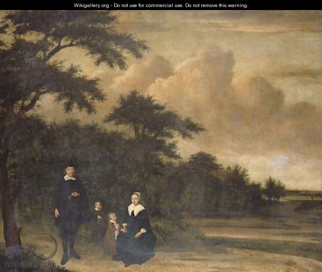A group portrait of a gentleman and a lady with their children in an extensive wooded landscape - Philips Koninck