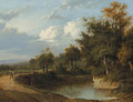 A wooded river landscape with a traveller on a track - Patrick Nasmyth