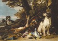 Hounds with dead game and a rifle in a landscape - (after) David De Coninck