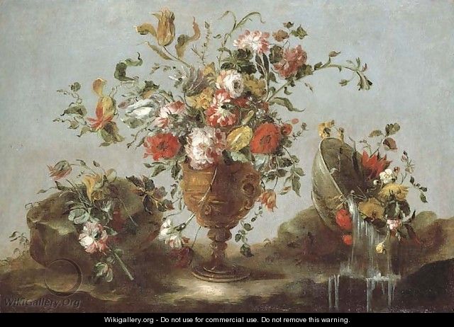 Roses, peonies and tulips in a gold sculpted urn with flowers in a pewter bowl by a rock pool - (after) Francesco Guardi