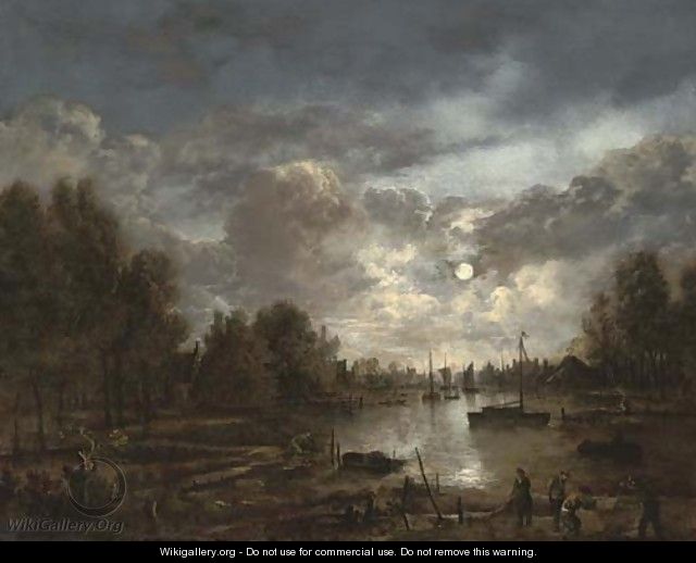 A moonlit river landscape with figures and shipping, a town beyond - (after) Aert Van Der Neer