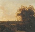 A wooded landscape with a sportsman and his dog on a sandy road, a view of The Hague in the distance - Anthony Jansz van der Croos