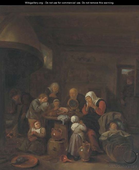 A kitchen interior with a peasant family praying before a meal - (after) Richard Brakenburgh