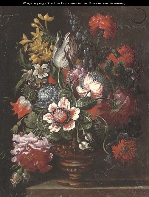 Parrot tulips, carnations, narcissi, roses and other flowers in an urn on a stone ledge - (follower of) Nuzzi, Mario