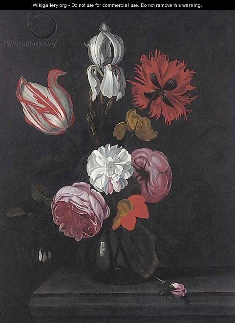 A parrot tulip, roses, an iris and other flowers in a glass vase on a stone ledge - (after) Marten Nellius