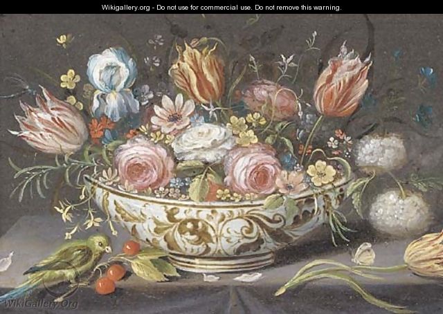 Carnations, roses, tulips and other flowers in a porcelain bowl on a ledge with a finch, cherries and a butterfly - (attr. to) Kessel, Jan van