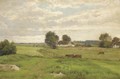 Cattle grazing in a meadow before a farmstead - Axel Birkhammer