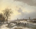 Late afternoon with numerous skaters by a town - Barend Cornelis Koekkoek