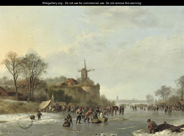 An extensive winter landscape with numerous figures by a 