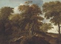 An extensive wooded landscape with travellers on a track - (after) Jan Lagoor
