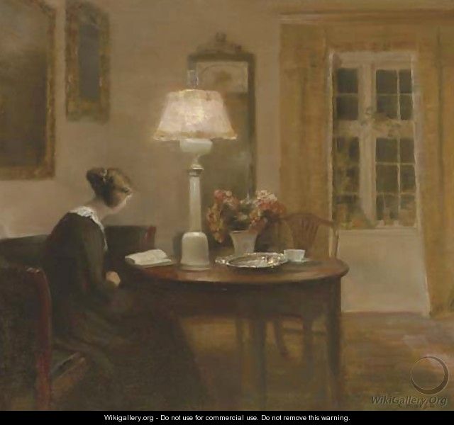 Woman Reading by Lamplight - Carl Vilhelm Holsoe