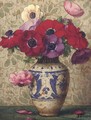 Pansies in a blue and white vase - Ernest Filliard