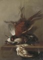 A pheasant, a duck and other dead game on a ledge - (after) Jean-Baptiste Oudry