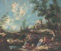 A landscape with anglers by a river, a town beyond - (after) Francesco Guardi