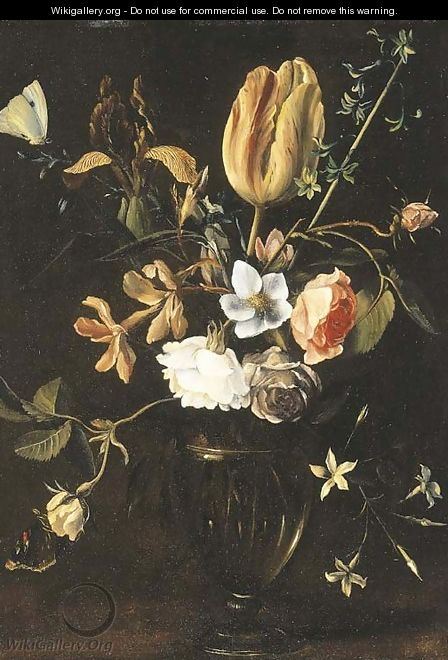 Roses, an iris, a tulip, jasmine and other flowers in a facon de Venise glass on a ledge with butterflies - (after) Daniel Seghers