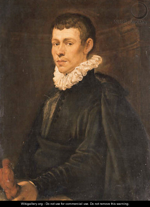 Portrait of a young sculptor, half-length, in a dark coat and jacket, holding a figurine - Domenico Tintoretto (Robusti)