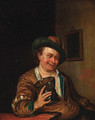 A peasant man holding a large roemer at a table in an interior - (after) Willem Van Mieris
